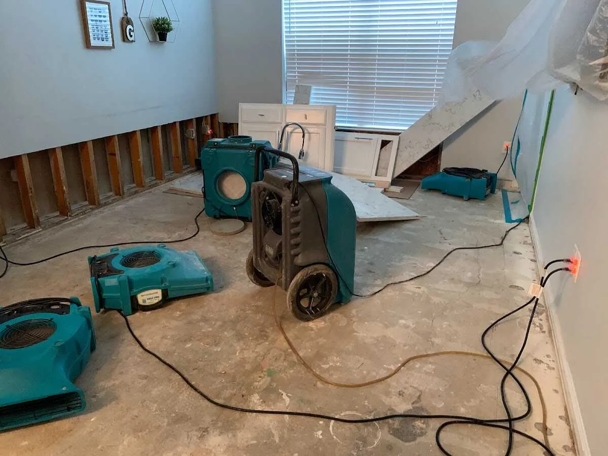 Dehumidifier in flood-cut room for Water Damage Restoration in Rock Falls